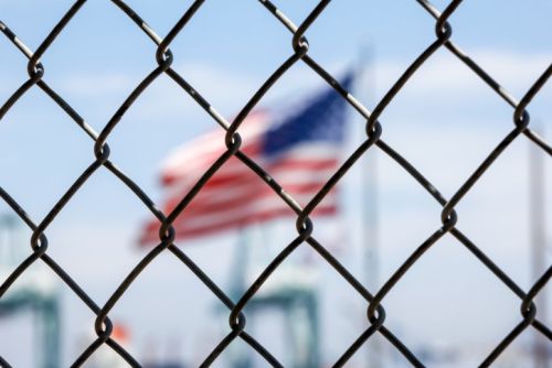 flag thru fence